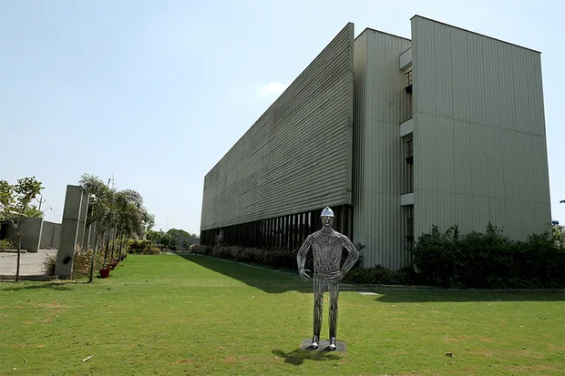 Standing steel figure on the lawn