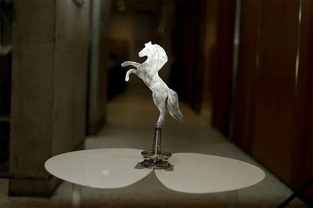 Rearing horse in polished stainless steel