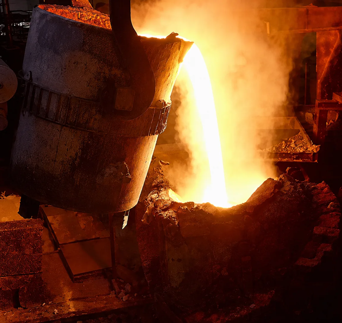 Molten steel pouring from the ladle in the Laxcon melting shop